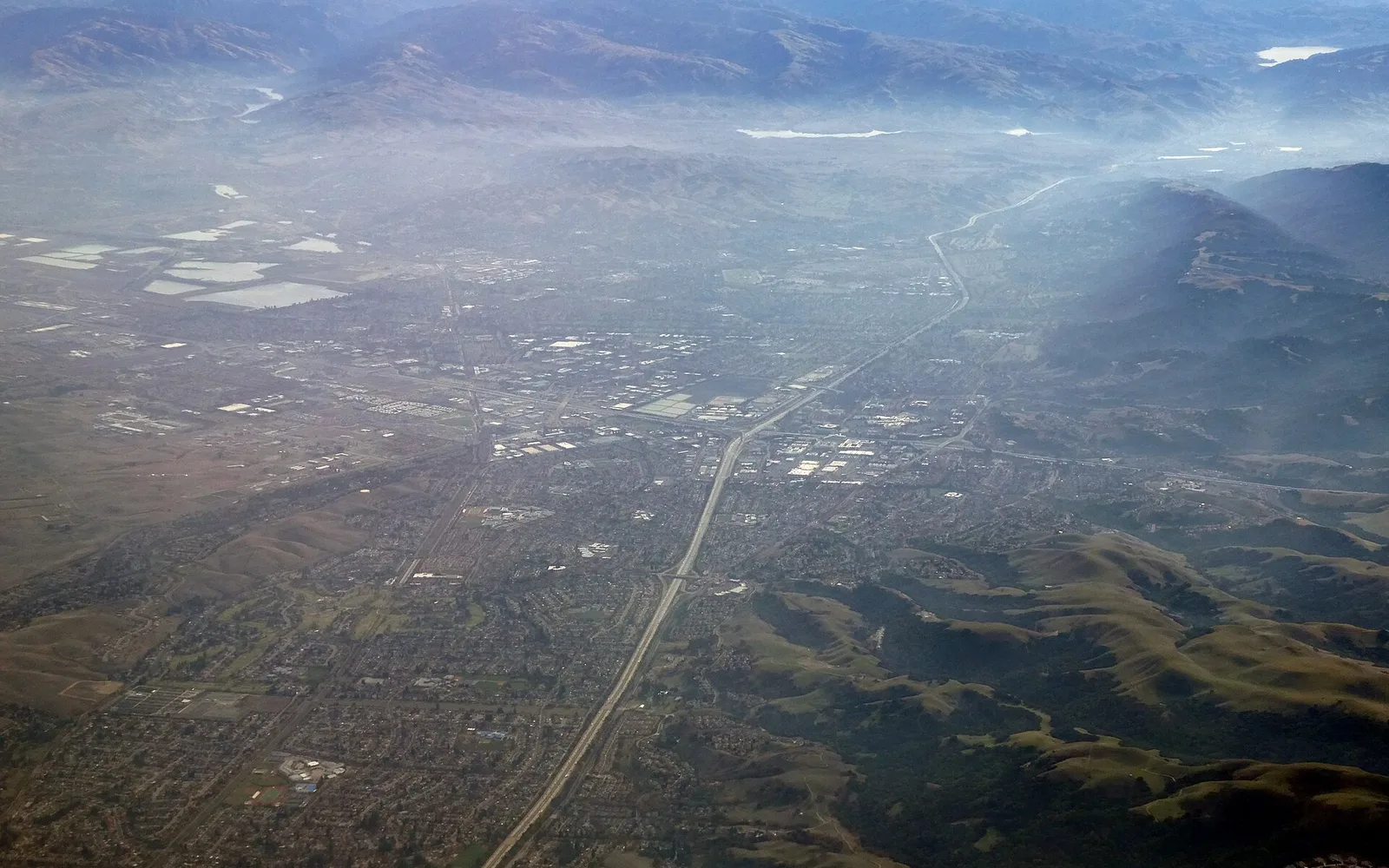 Aerial view of Dublin and Pleasanton with morning fog in December 2023.