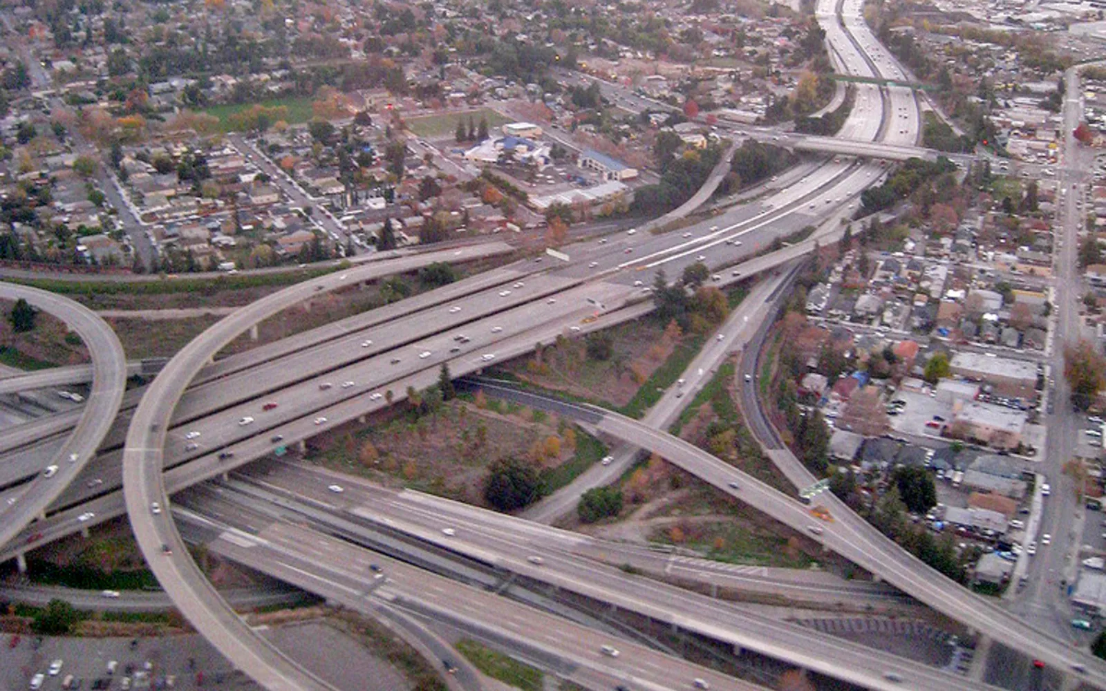 Aerial view of a major highway interchange showing multiple lanes and traffic patterns